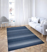Modern area rug with blue and neutral stripes.